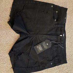 Black denim shorts